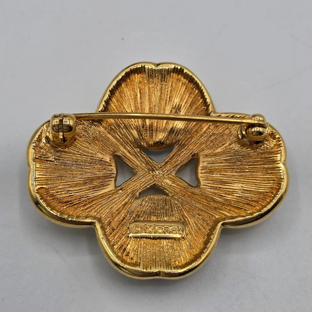 Vintage Monet Gold Tone Blue Glass Cabochon Quatrefoil Brooch Pin Abstract Retro